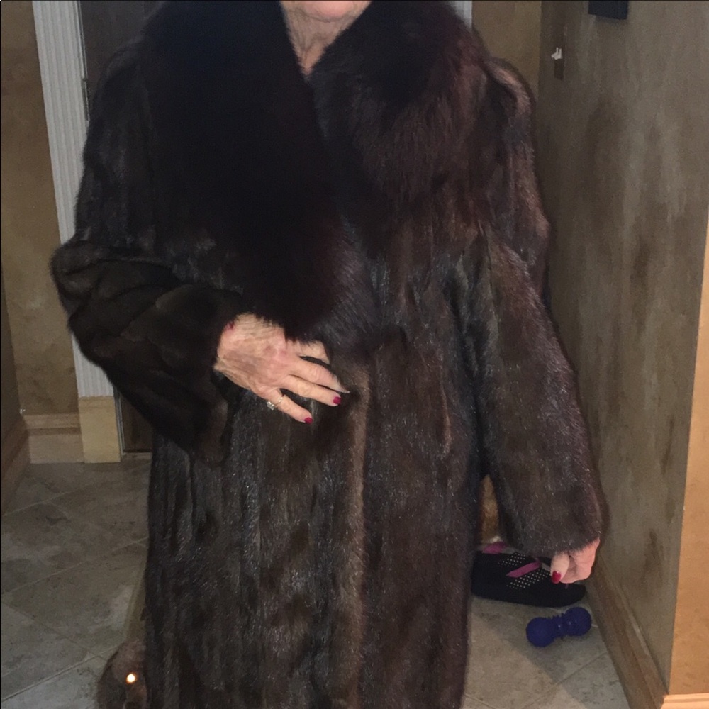 Brown mink with fox fur coat from Finland .